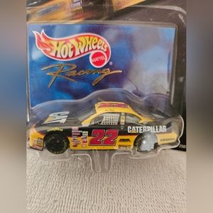 Hot Wheels 1:64 scale die cast car. NASCAR #22 CATERPILLAR